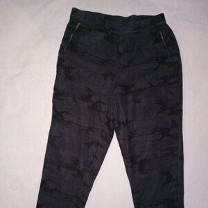 Gray camouflage pants.